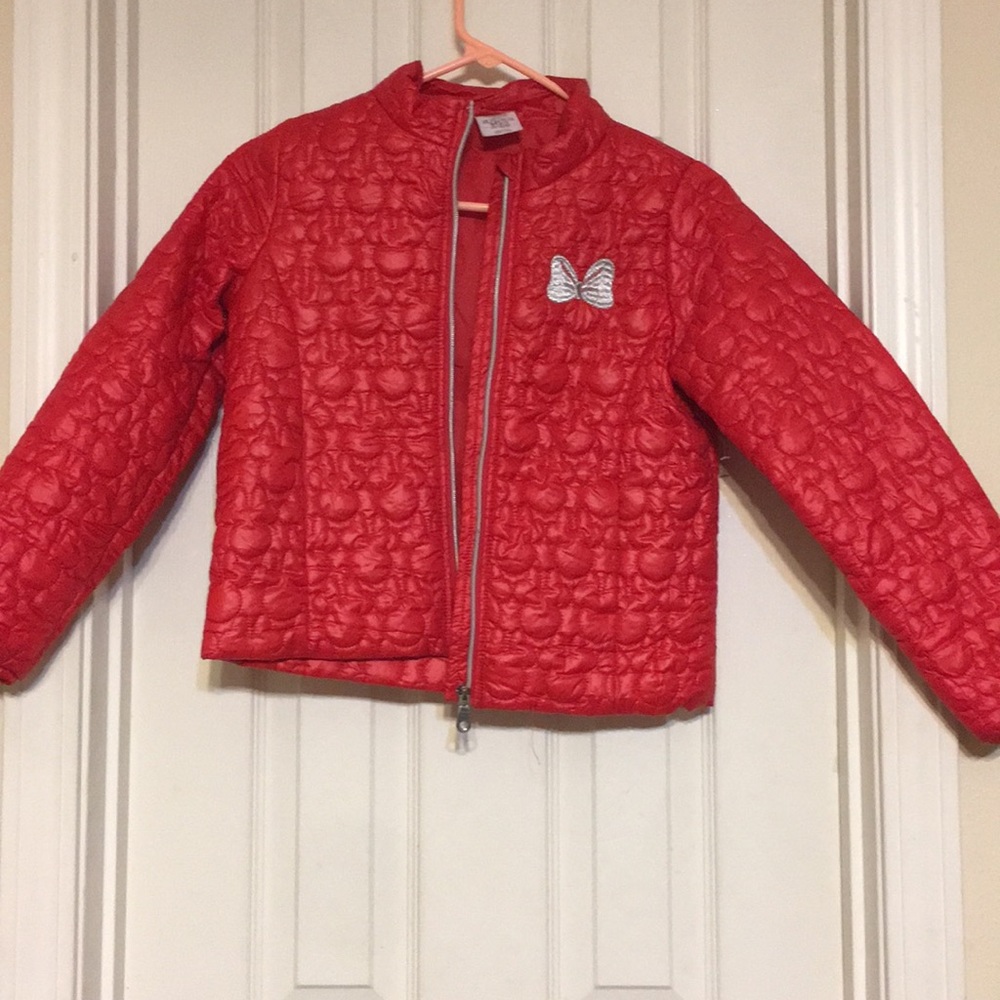Red puffer jacket.